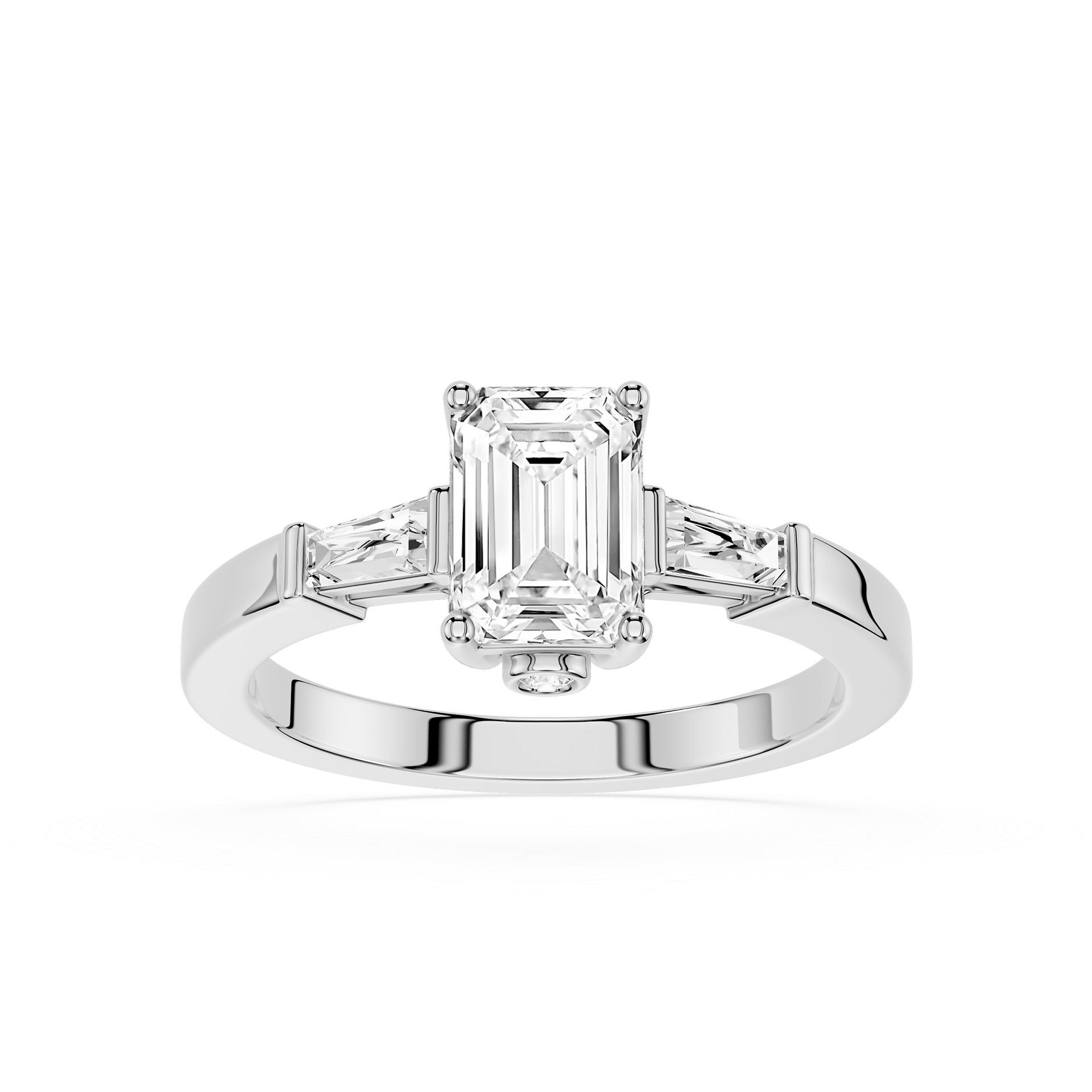 Diamond ring with emerald-cut center stone and smaller side stones on a white background