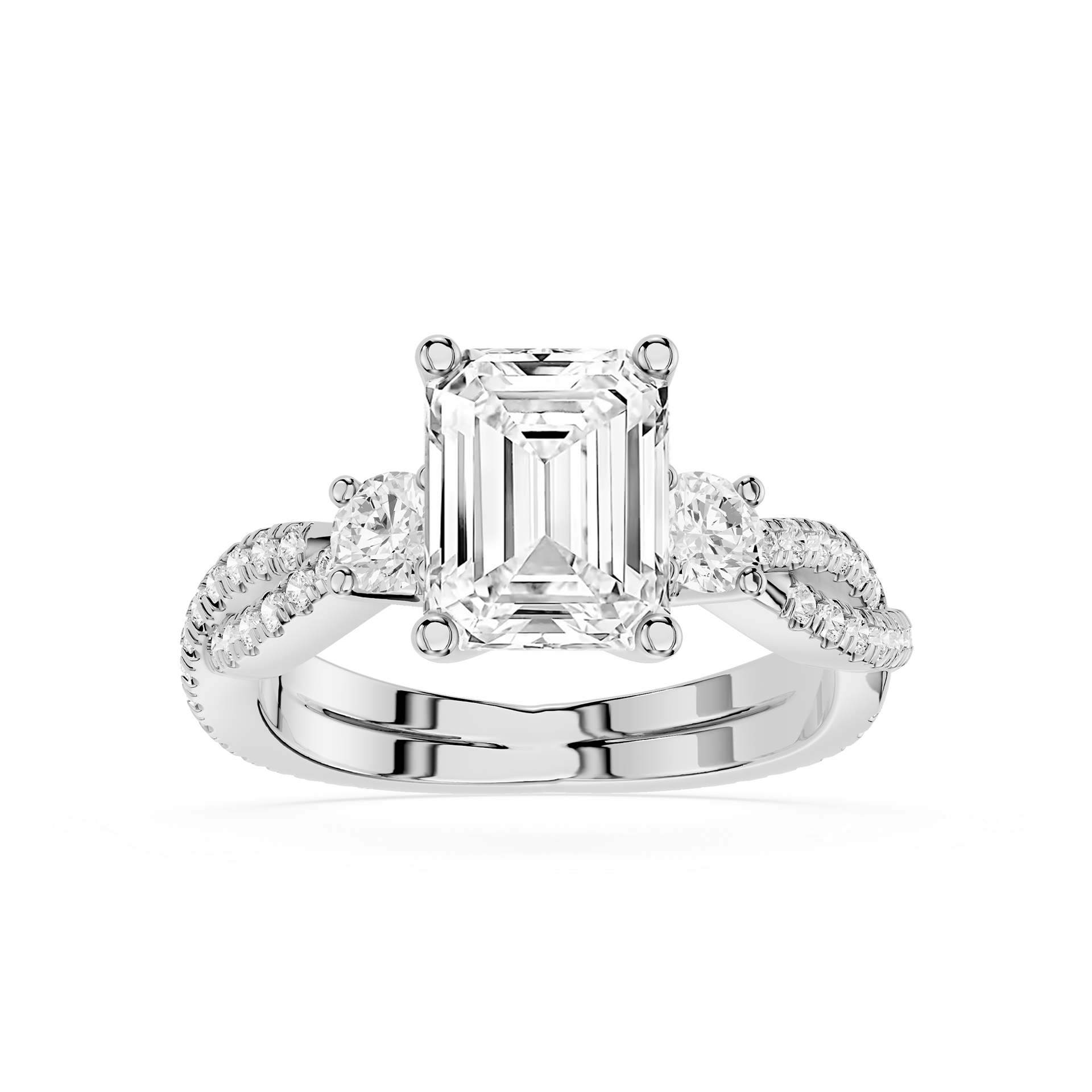 Diamond ring with emerald-cut center stone on a white background