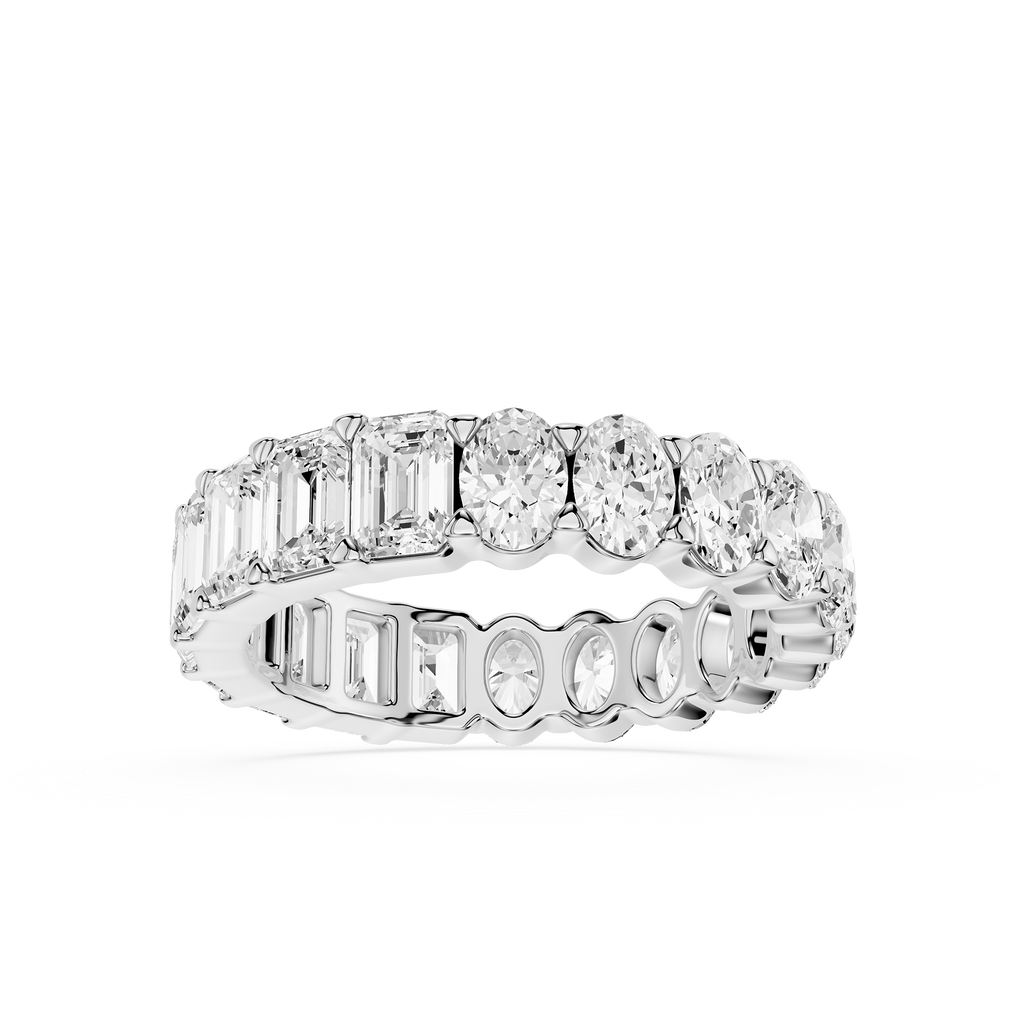 Diamond ring with various cut diamonds on a white background