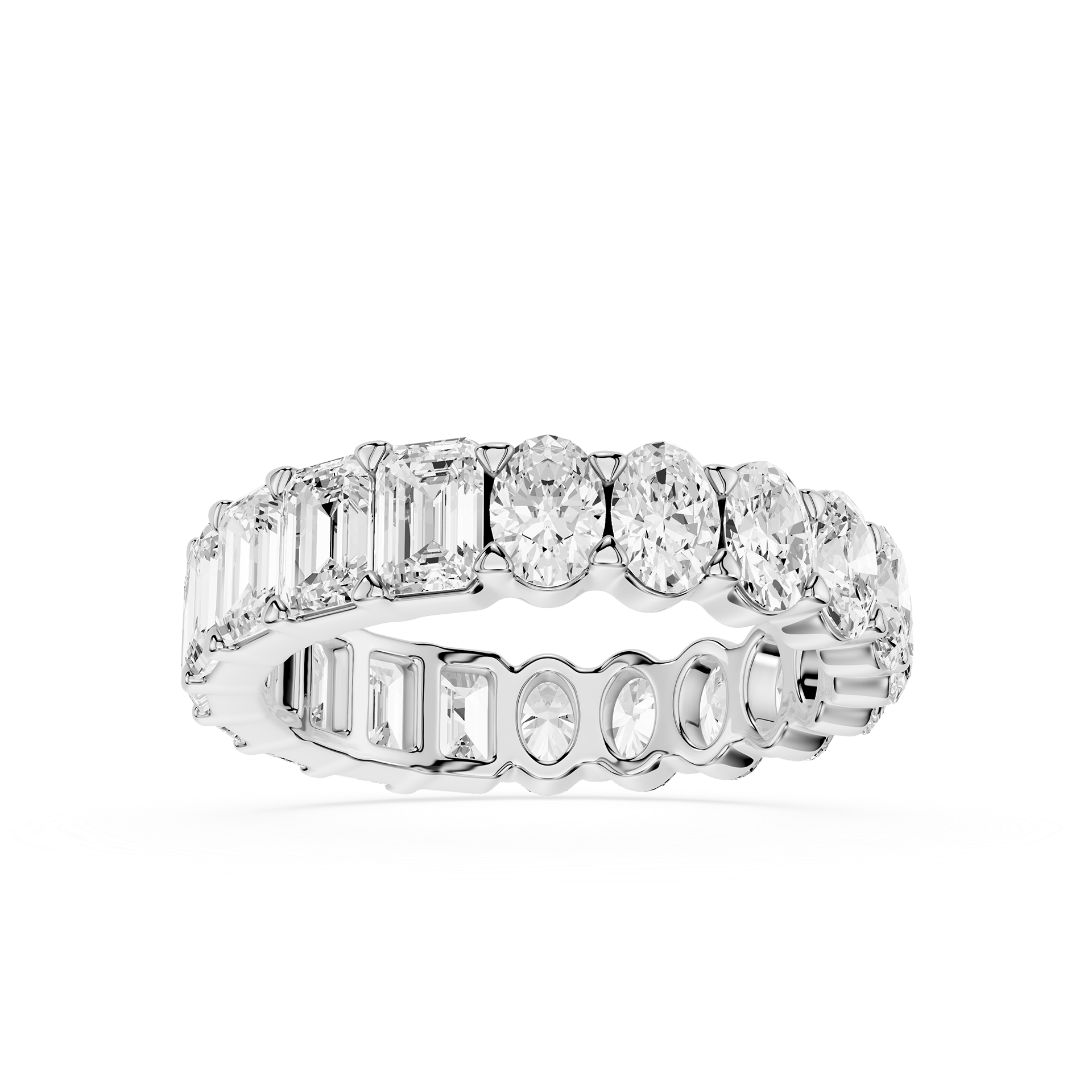 Diamond ring with various cut diamonds on a white background