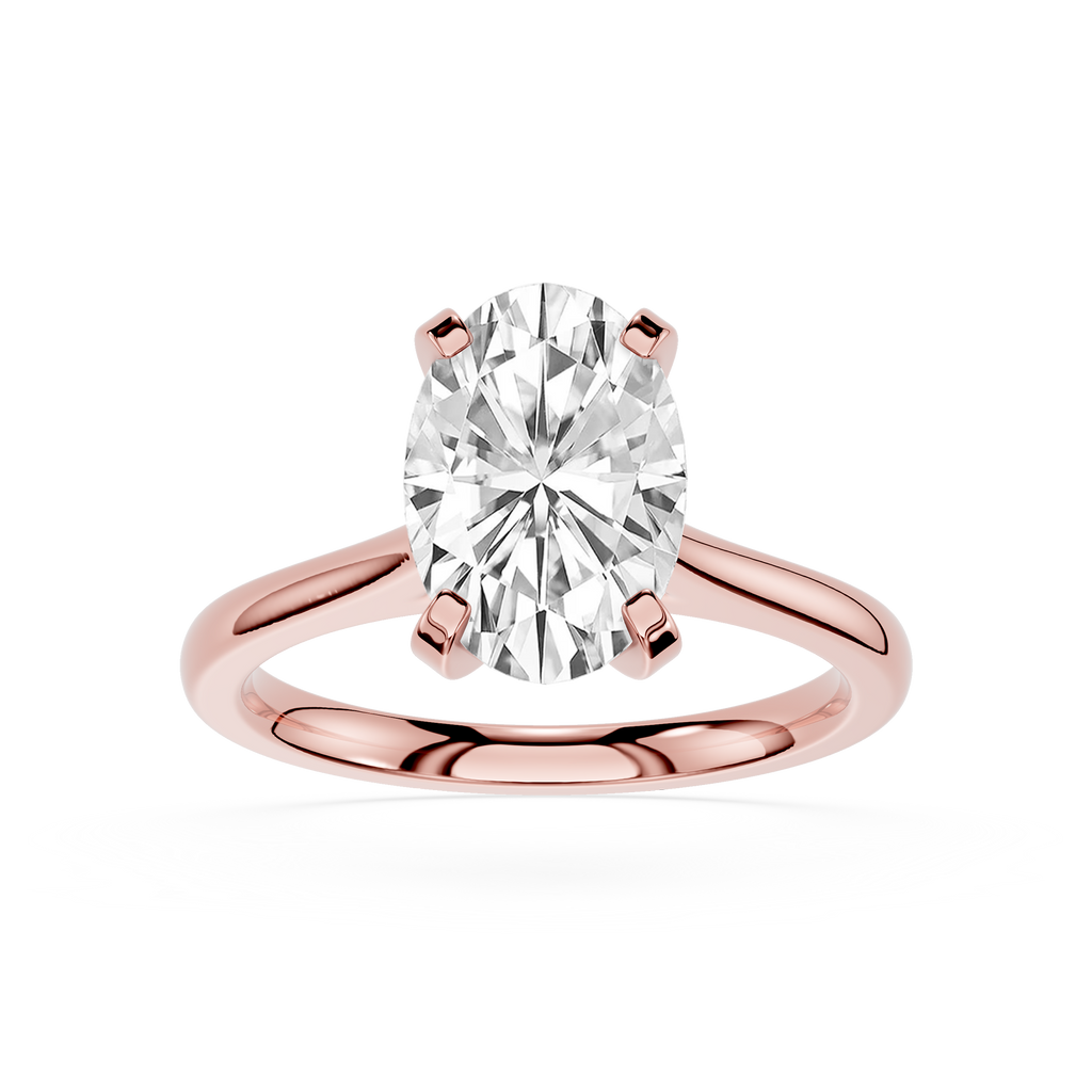 Rose gold ring with a large diamond on a white background