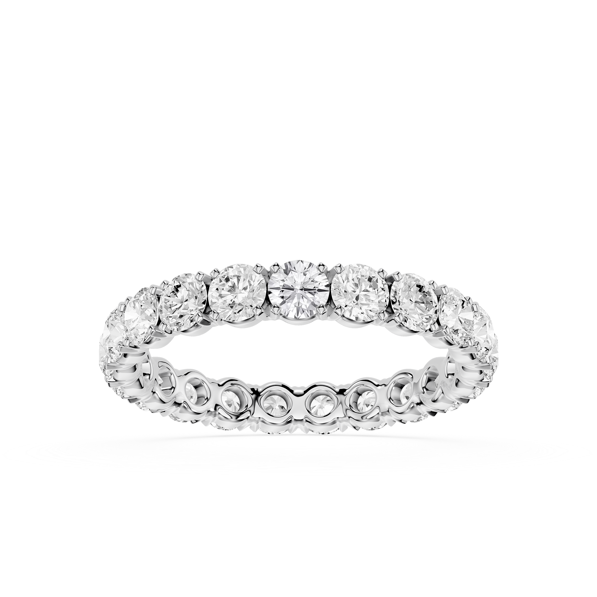 A diamond eternity band ring in a silver-toned setting, shown on a clean white background.