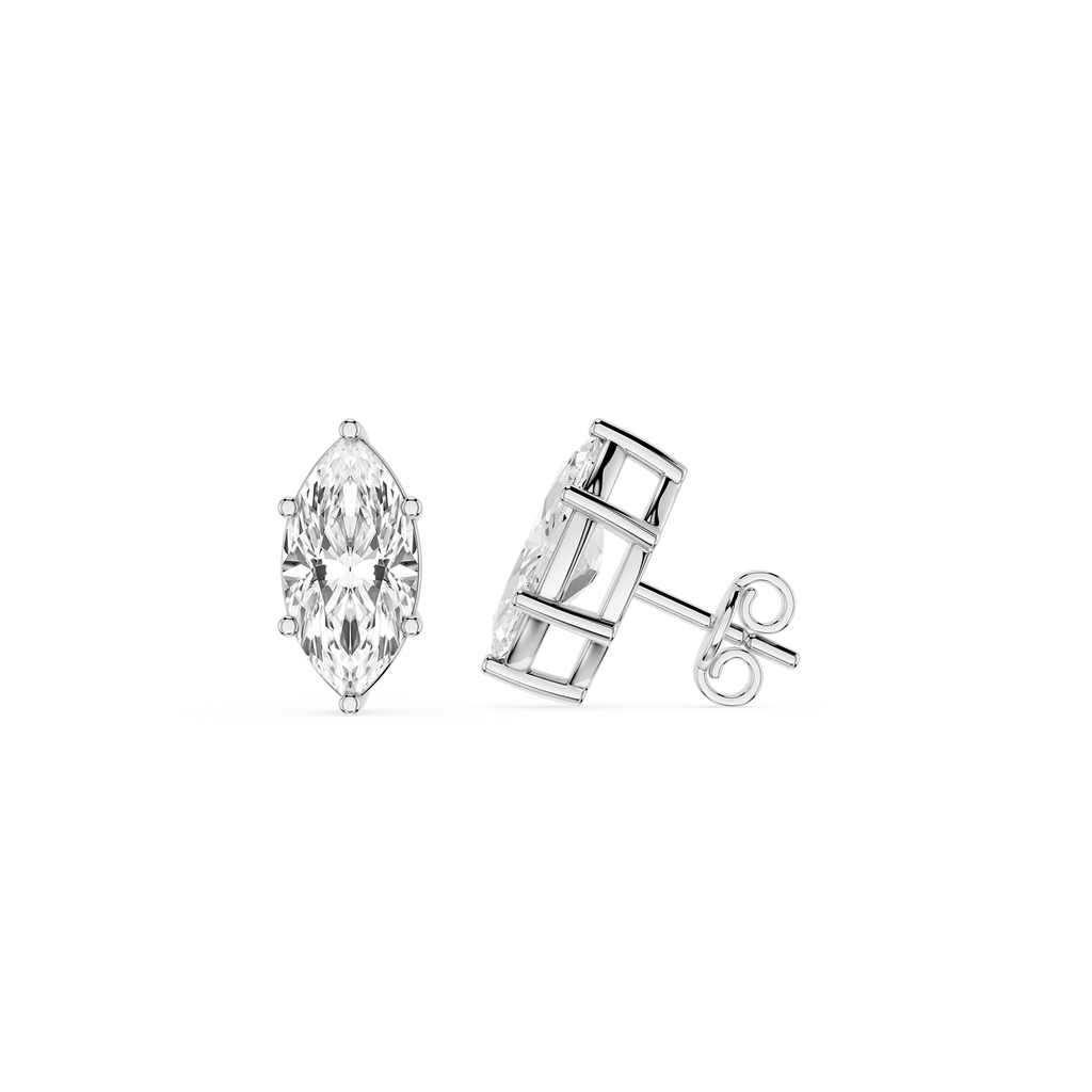 Silver earrings with clear gemstones on a white background