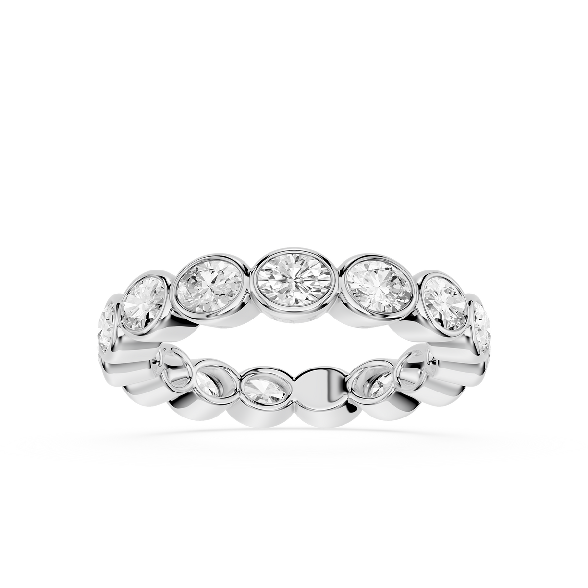 Modern oval diamond eternity band crafted in white gold, highlighting bezel-set lab grown diamonds with a refined low-profile setting.