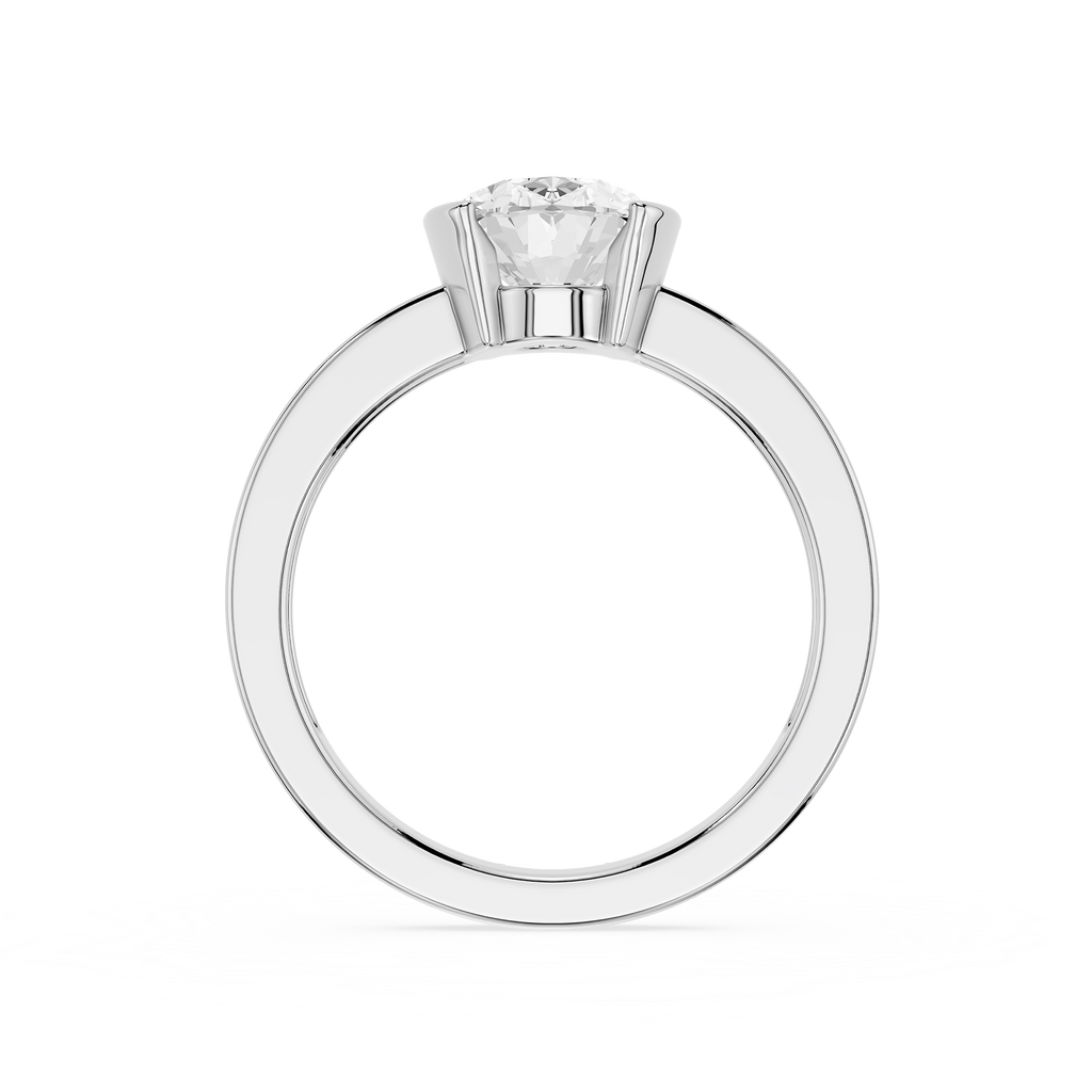 Diamond ring with a central diamond flanked by two smaller diamonds on a white background