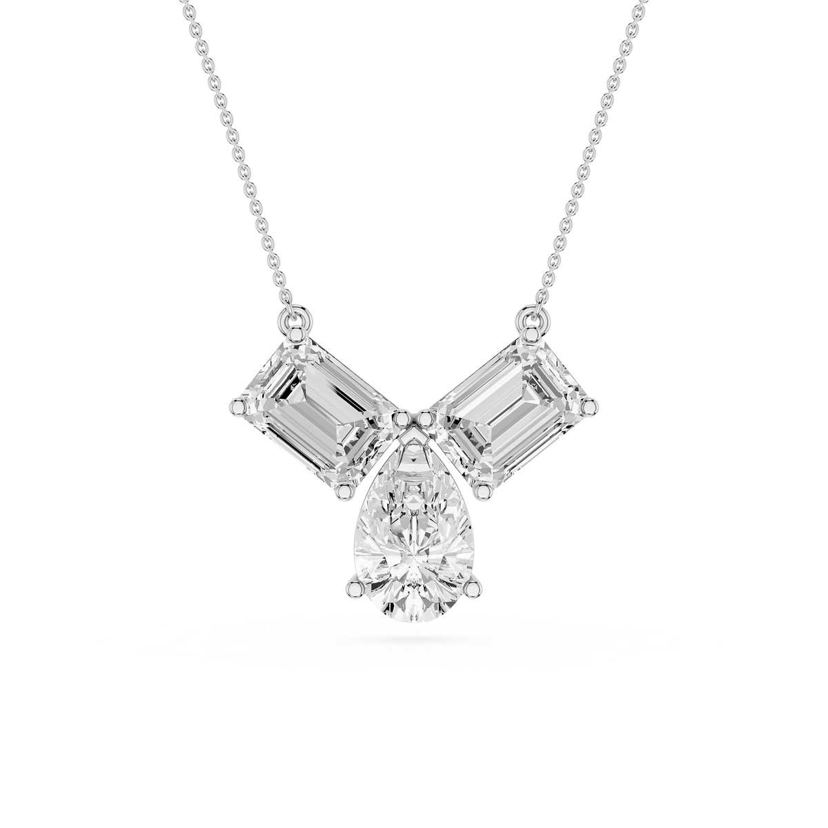 Diamond necklace with emerald-cut and pear-shaped diamonds on a white background