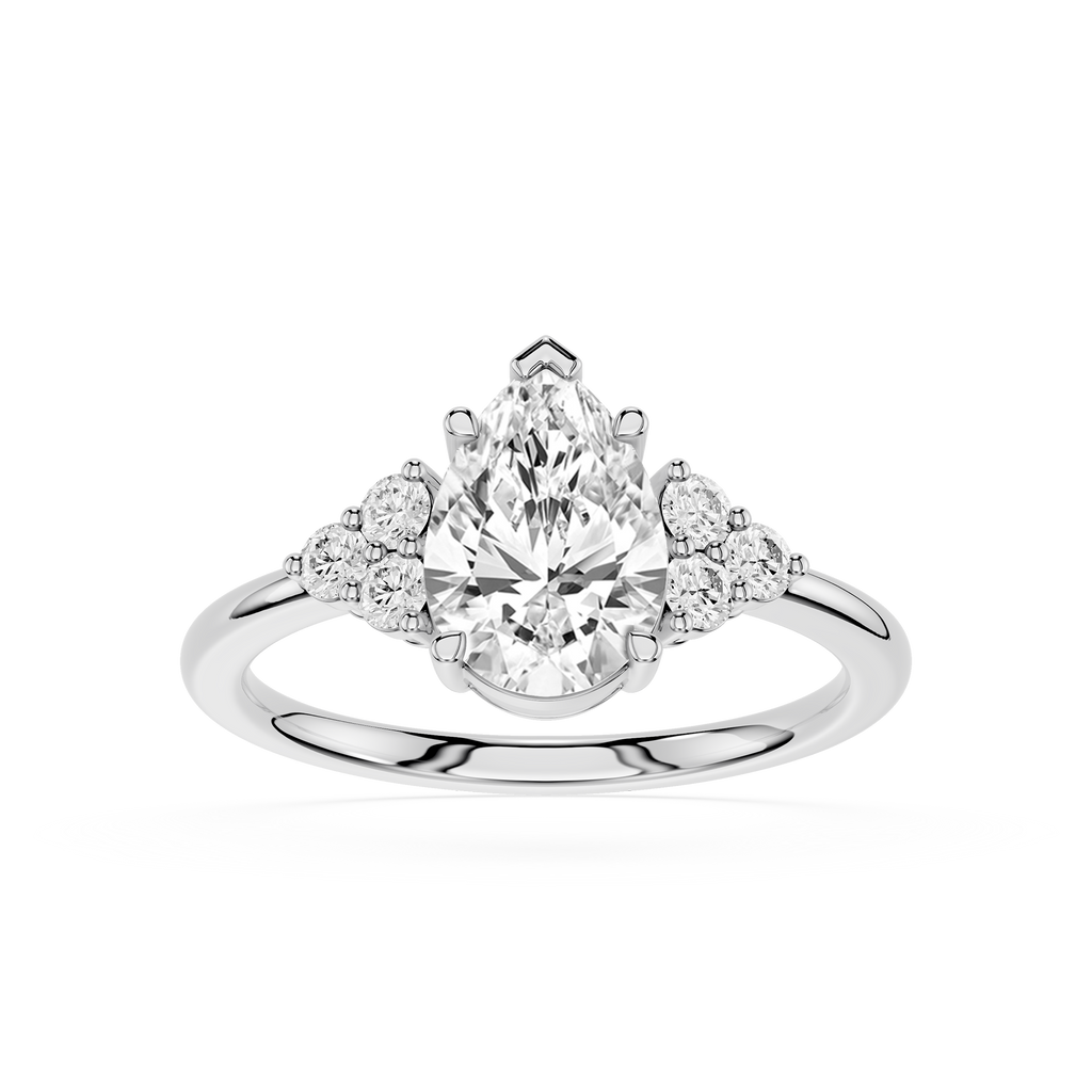 Diamond ring with pear-shaped center stone and smaller round stones on a white background