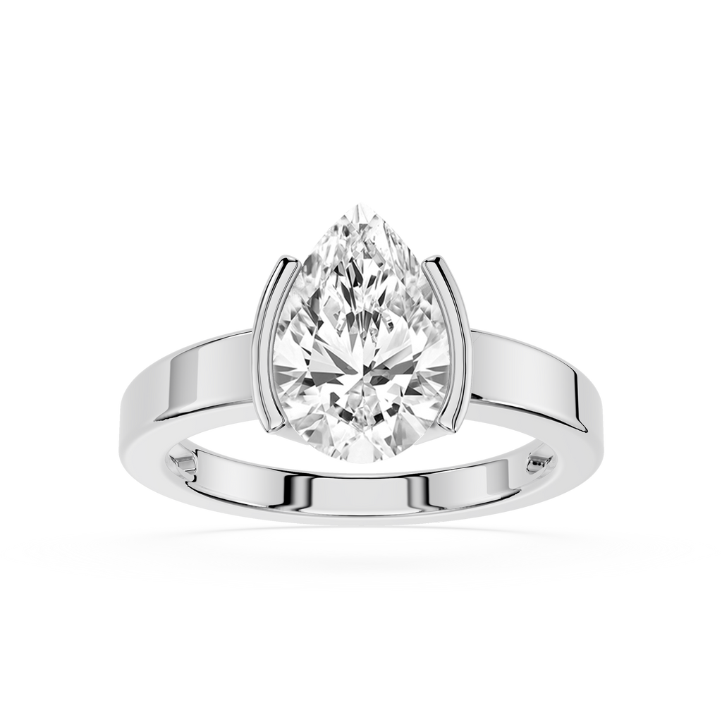 Diamond ring with pear-shaped gemstone on a white background