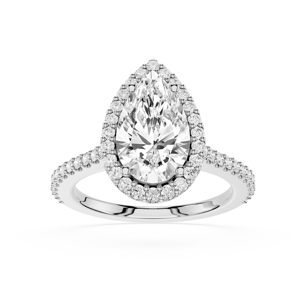 Diamond ring with pear-shaped center stone on a white background