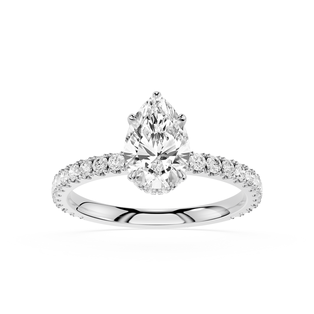 Diamond ring with a pear-shaped center stone on a white background