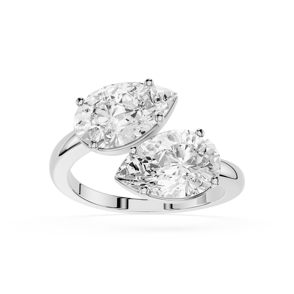 Diamond ring with two pear-shaped diamonds on a white background