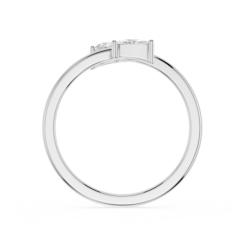A silver-toned diamond ring shown from the back, featuring a round brilliant-cut diamond center stone and smaller side diamonds, set against a plain white background.