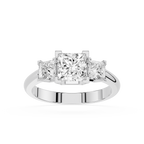 Diamond ring with three princess-cut diamonds on a white background