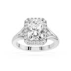 Diamond ring with a large central gemstone and smaller stones on a white background