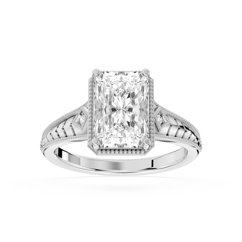 White gold radiant cut lab grown diamond engagement ring featuring detailed filigree shoulders and a four prong setting