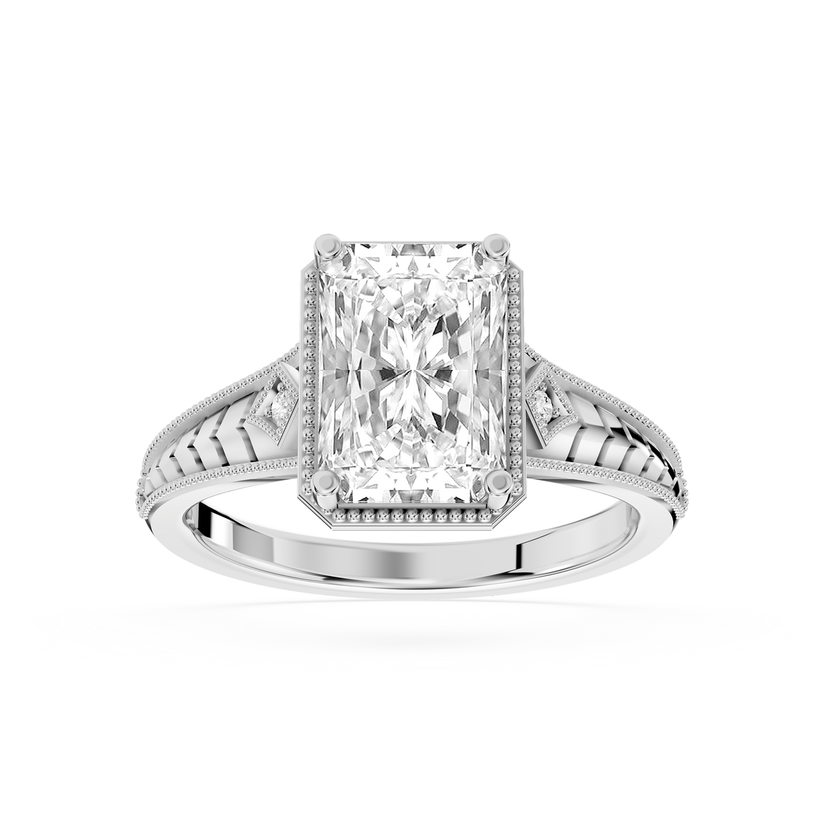 White gold radiant cut lab grown diamond engagement ring featuring detailed filigree shoulders and a four prong setting