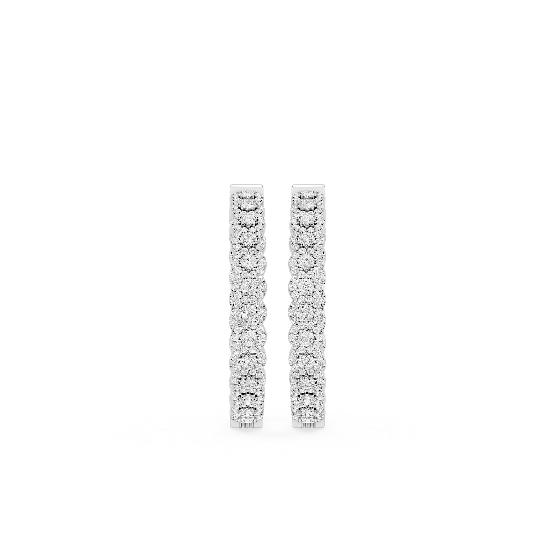 Pair of diamond earrings on a white background