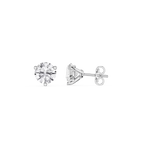 Four metallic brake pads on a white background