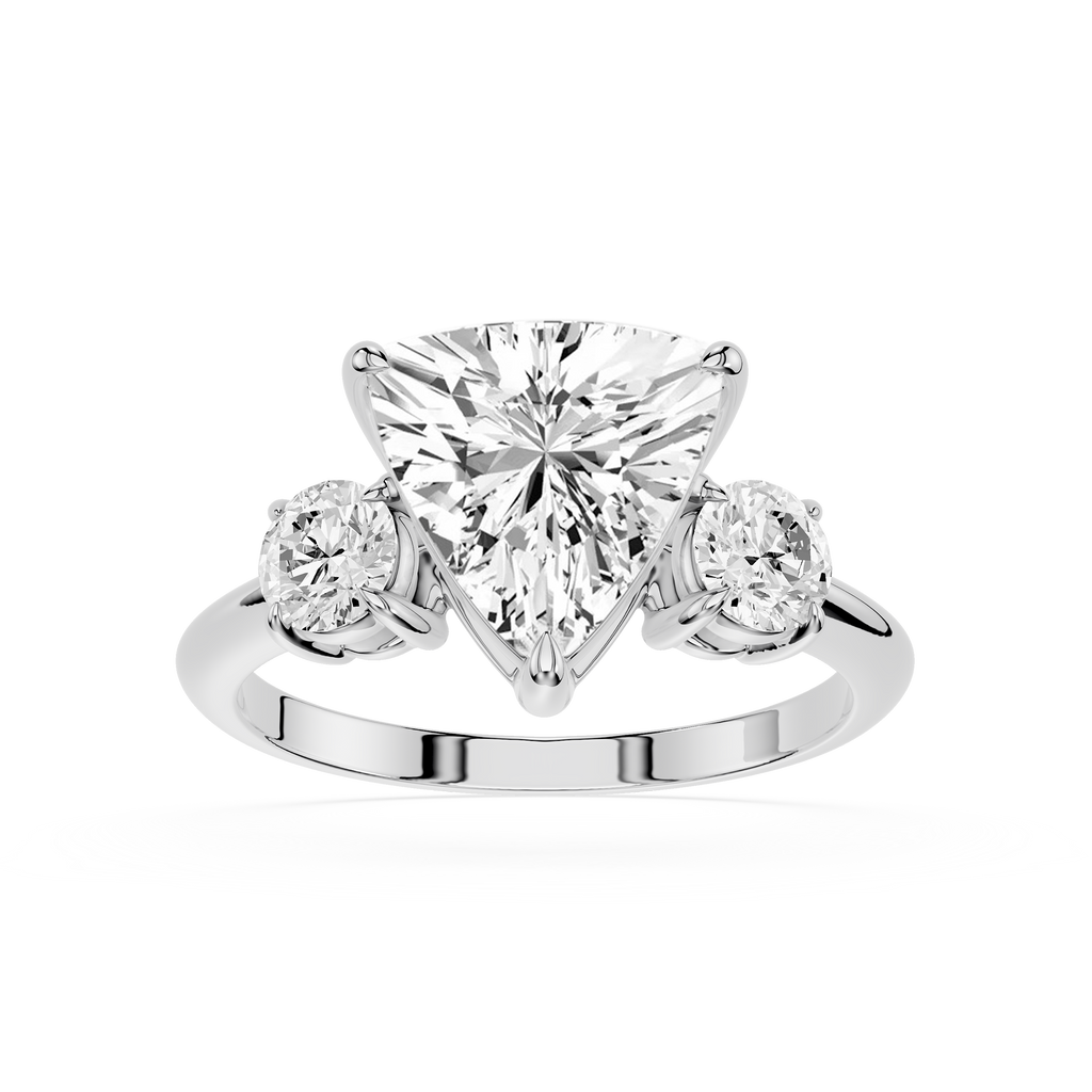 Diamond ring with a heart-shaped center stone on a white background