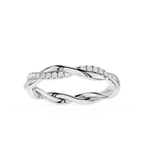 Silver ring with diamond accents on a white background