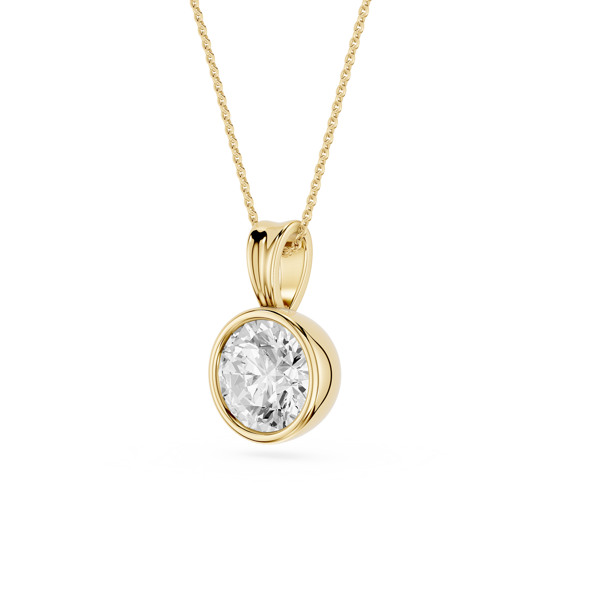 Gold pendant with a clear gemstone on a white background