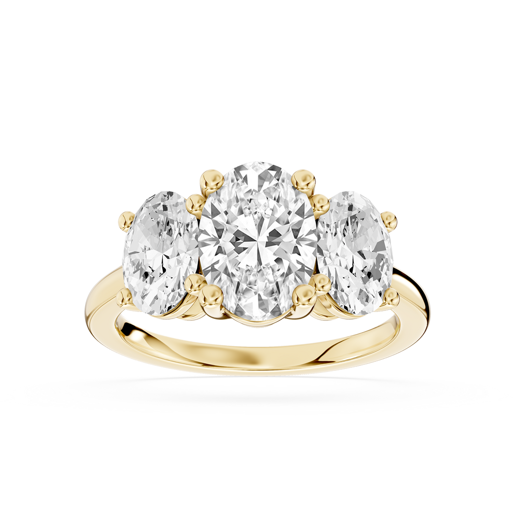 Yellow gold oval cut lab grown diamond three stone engagement ring featuring a larger center diamond and two oval side stones