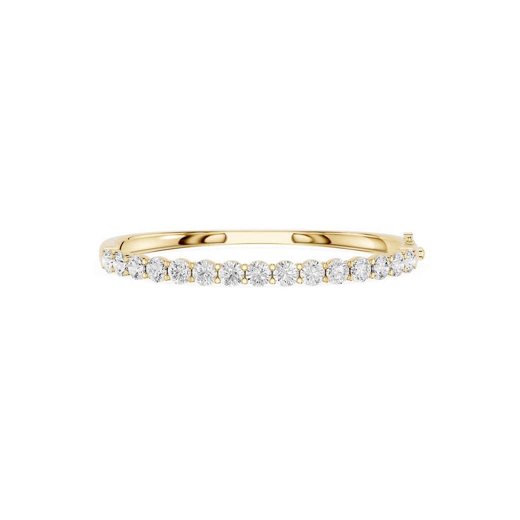 Gold ring with diamonds on a white background