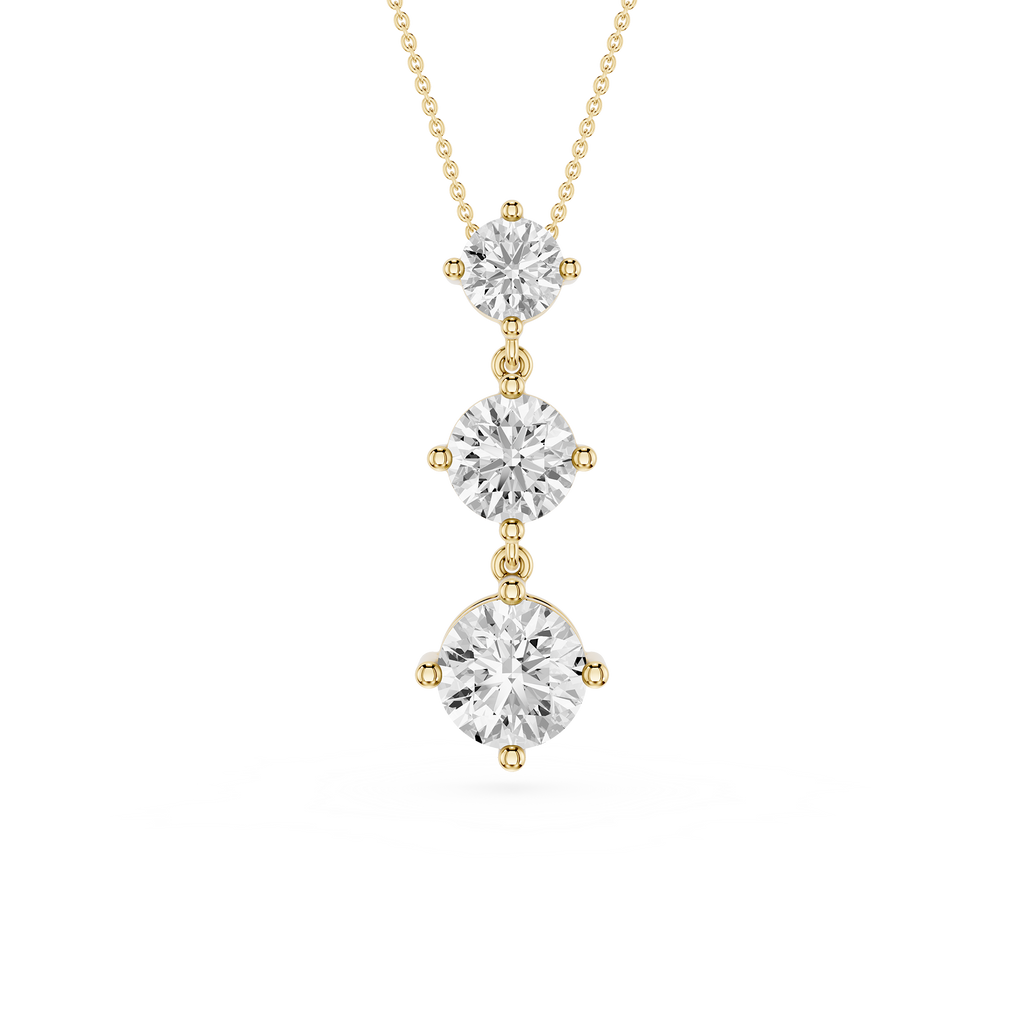 Three-tier diamond pendant on a gold chain against a white background