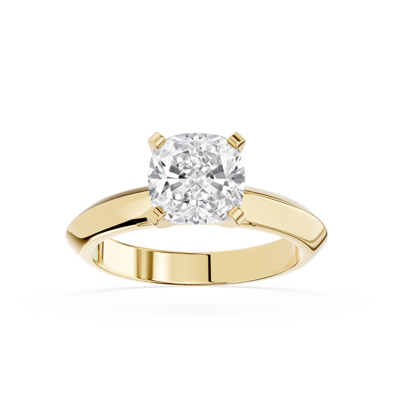 Gold ring with a large diamond on a white background