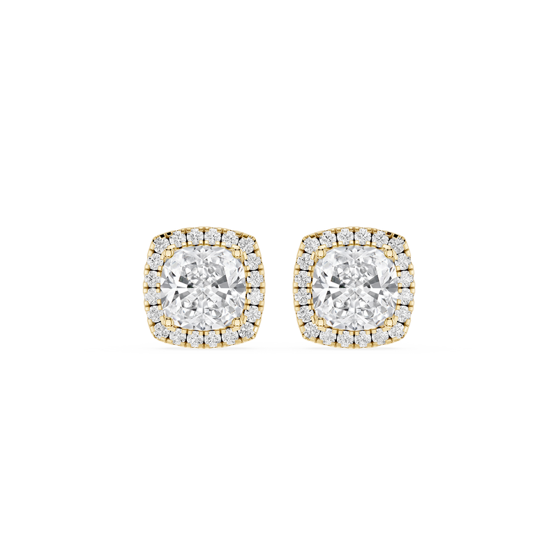 Pair of diamond stud earrings on a white background