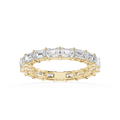 A Yellow gold eternity ring featuring a continuous line of baguette-cut clear gemstones, shown on a clean white background.