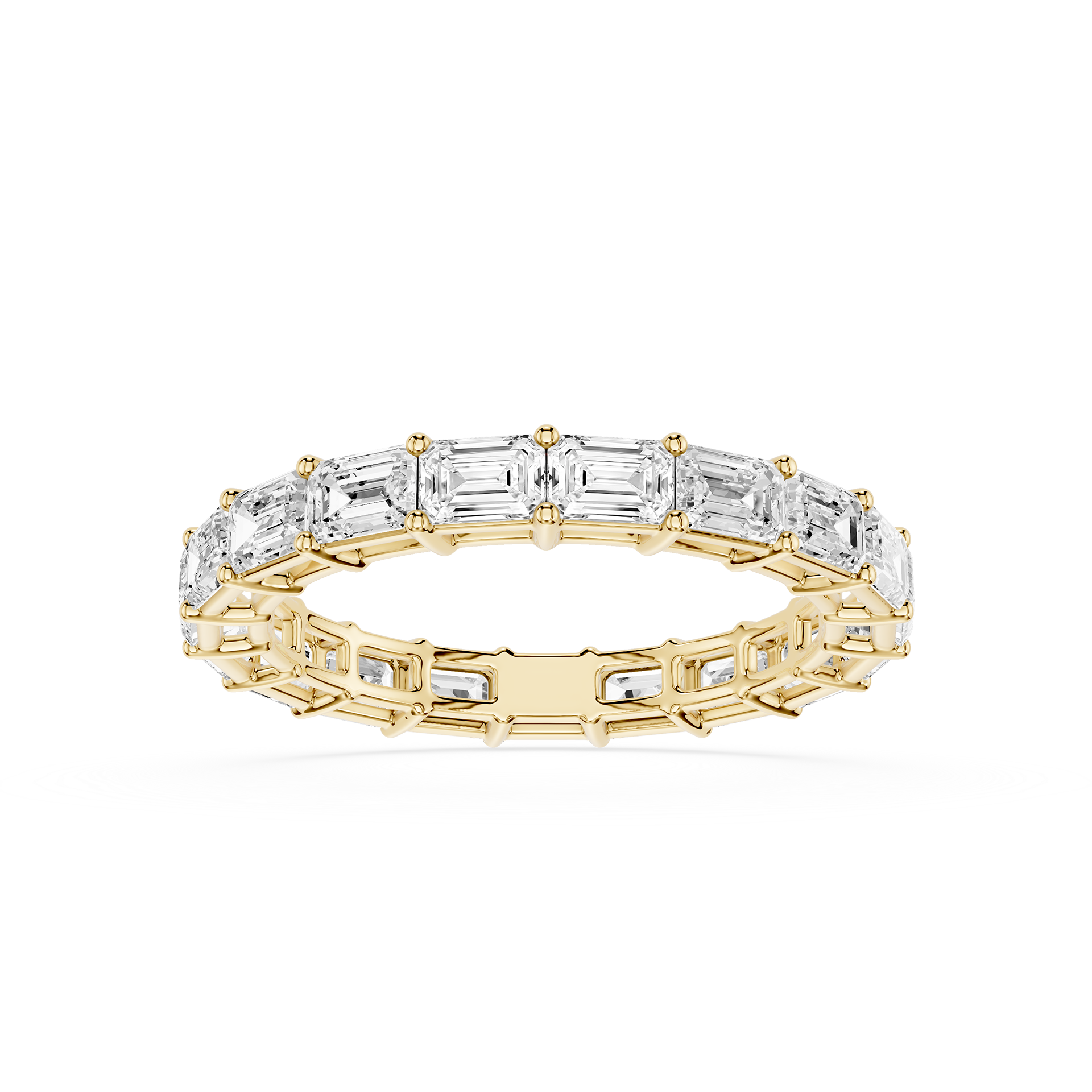 A Yellow gold eternity ring featuring a continuous line of baguette-cut clear gemstones, shown on a clean white background.