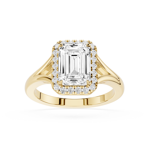 Gold ring with emerald-cut diamond and smaller diamonds on a white background