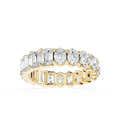 Gold ring with multiple diamonds on a white background