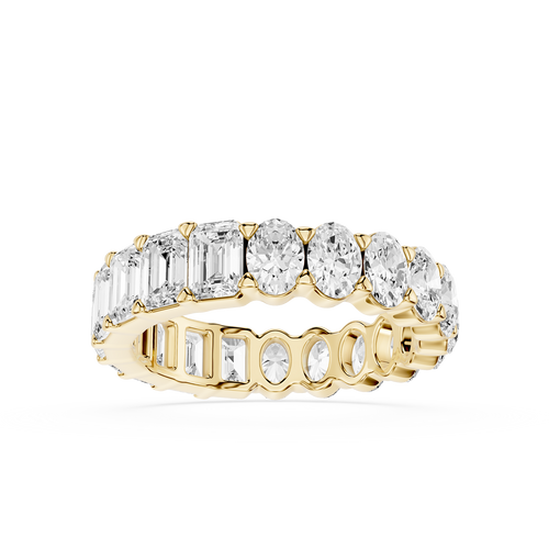 Gold ring with multiple diamonds on a white background