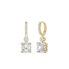 Gold and diamond earrings on a white background