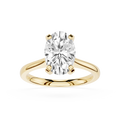 Gold ring with a large diamond on a white background