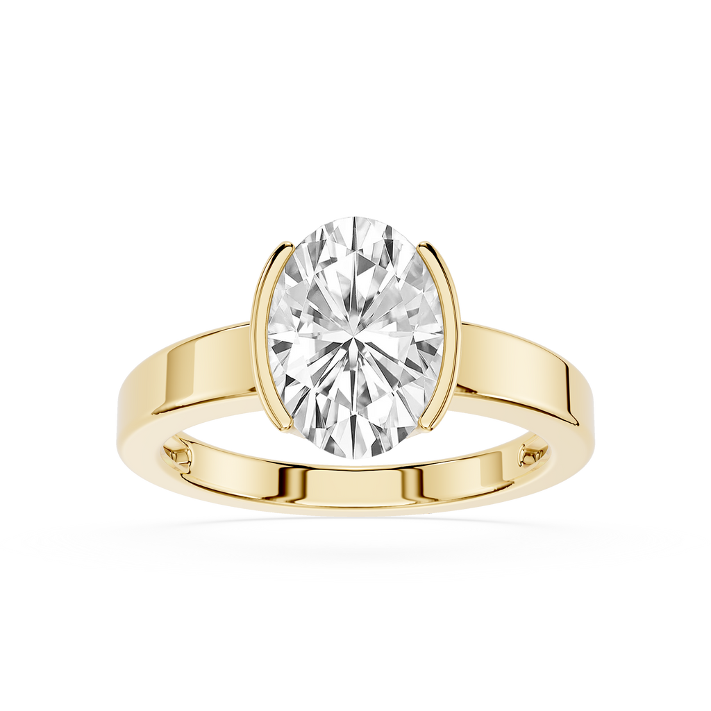 Gold ring with a large diamond on a white background