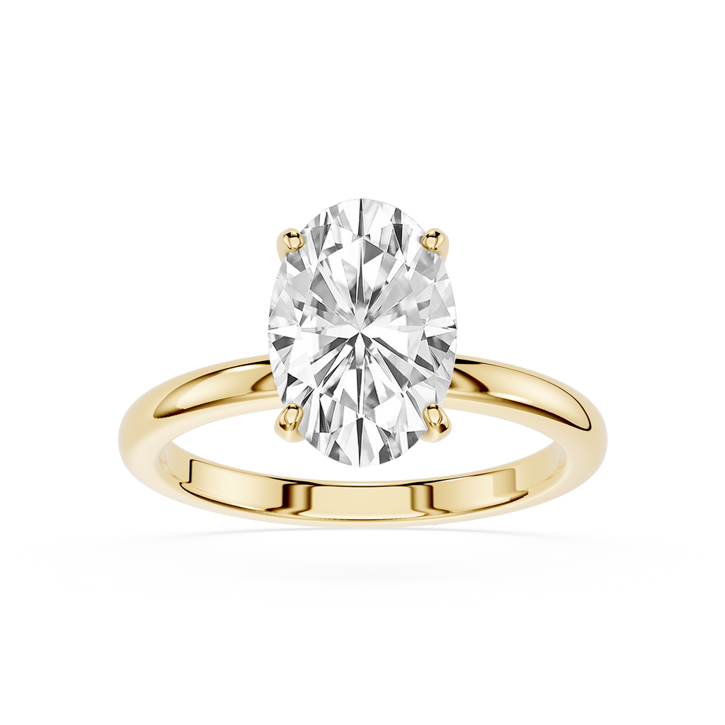 Gold ring with a large diamond on a white background