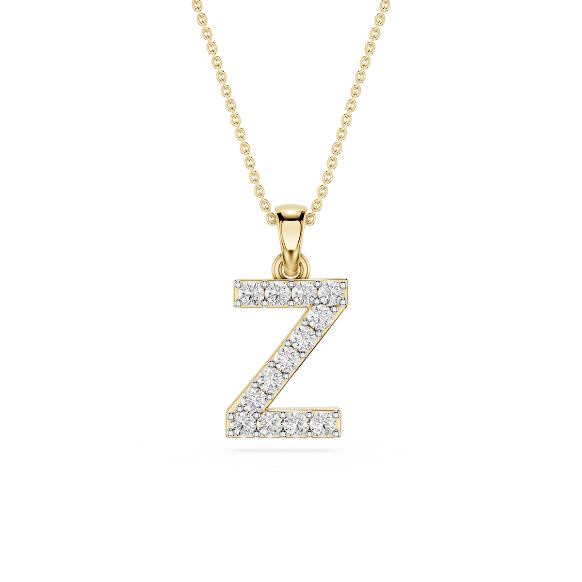 Gold necklace with a diamond-studded letter 'Z' pendant on a white background