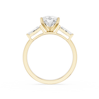 Gold ring with a diamond on a white background