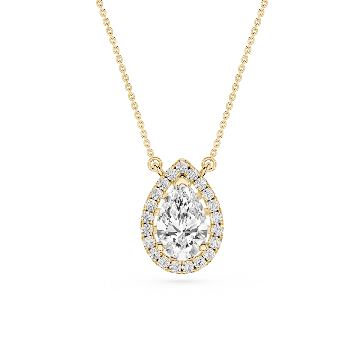 Yellow gold teardrop diamond necklace featuring a pear cut center stone surrounded by small round diamonds