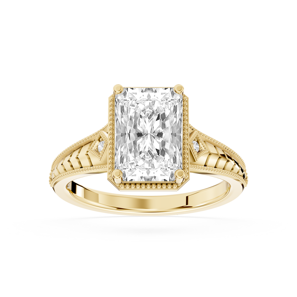 Yellow gold radiant cut lab grown diamond engagement ring featuring vintage filigree detailing and a milgrain border