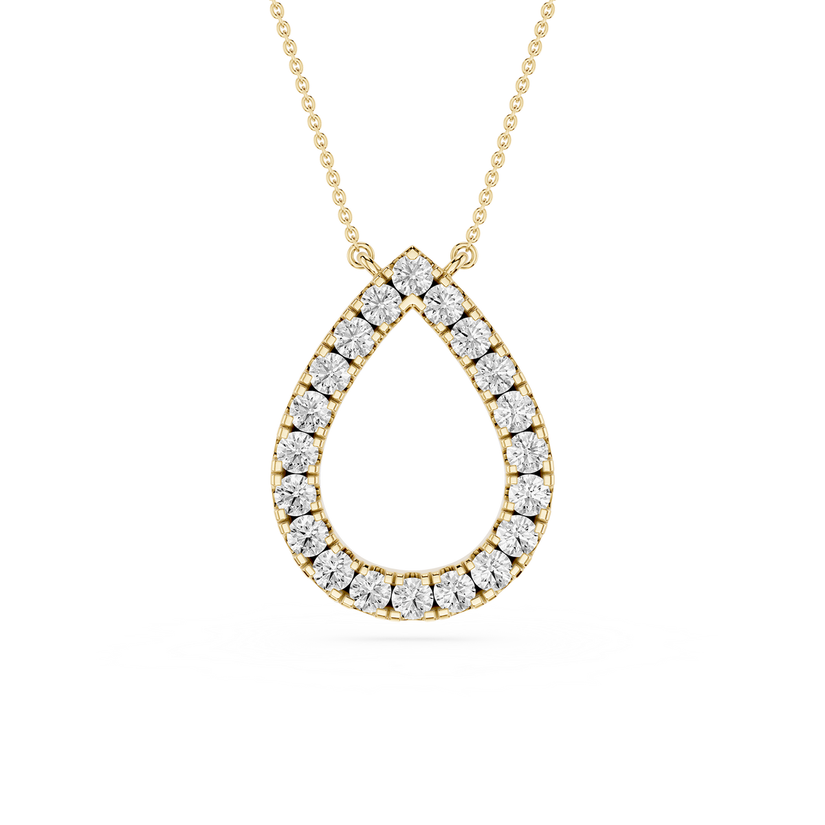Gold necklace with a teardrop-shaped diamond pendant on a white background