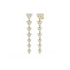 Gold and diamond earrings on a white background
