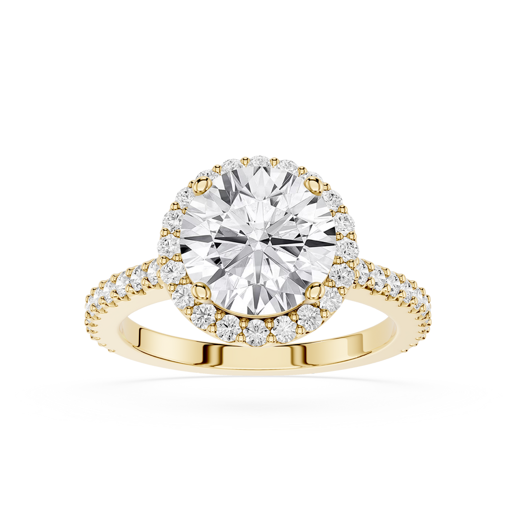 Gold ring with a large diamond and smaller diamonds on the band against a white background