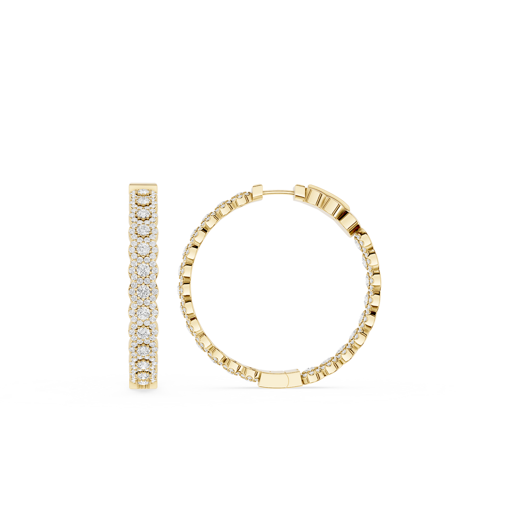 Gold hoop earrings with embedded stones on a white background