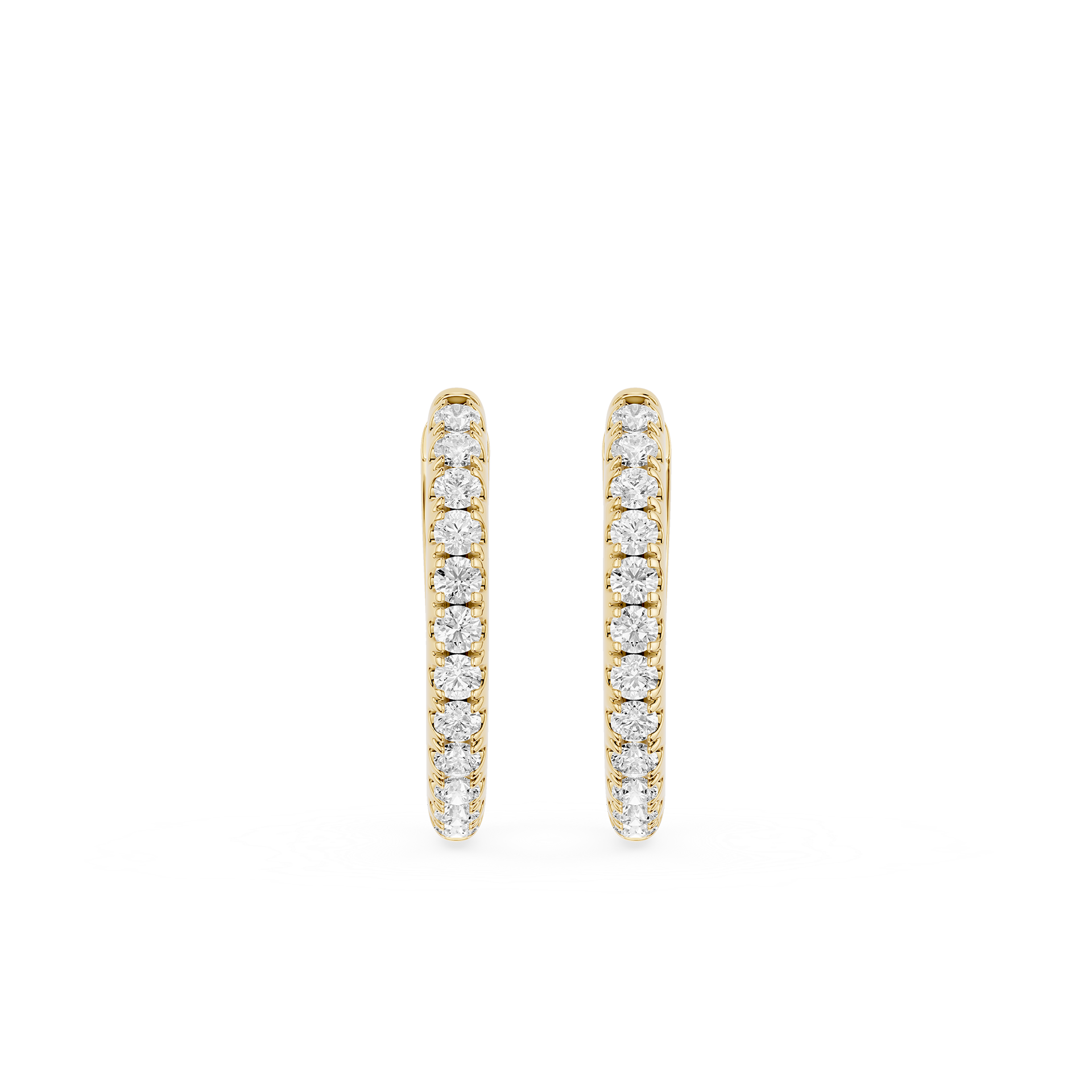 Gold hoop earrings with embedded diamonds on a white background