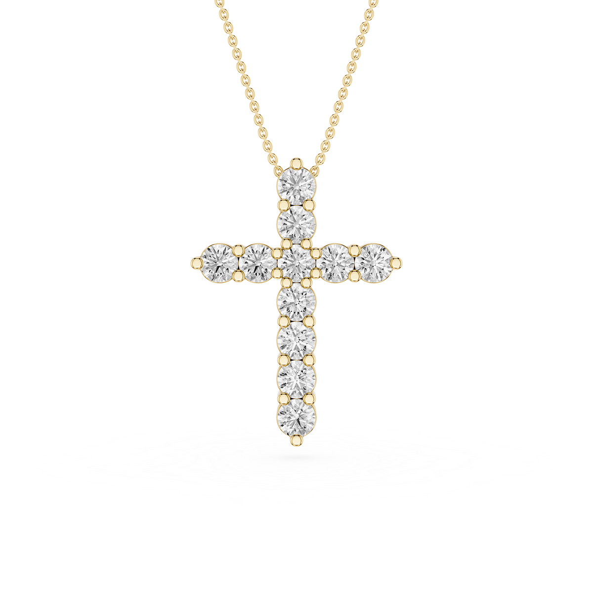 Gold cross pendant necklace with diamonds on a white background