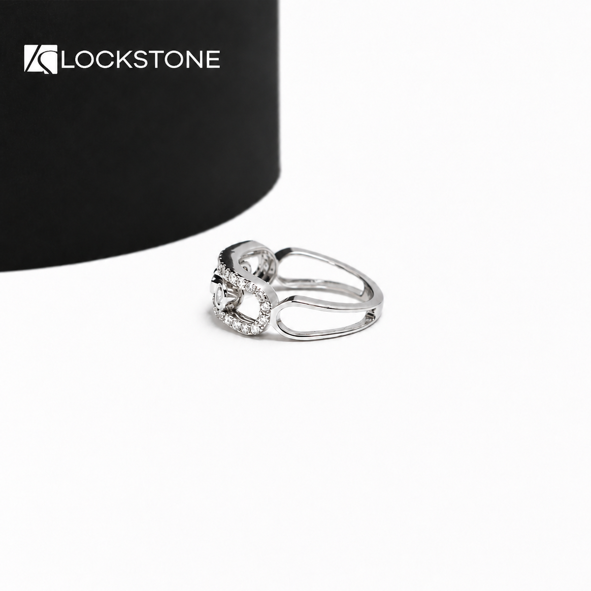 Yellow gold lab grown diamond wedding band featuring round bezel set diamonds, openwork details and pavé diamond borders